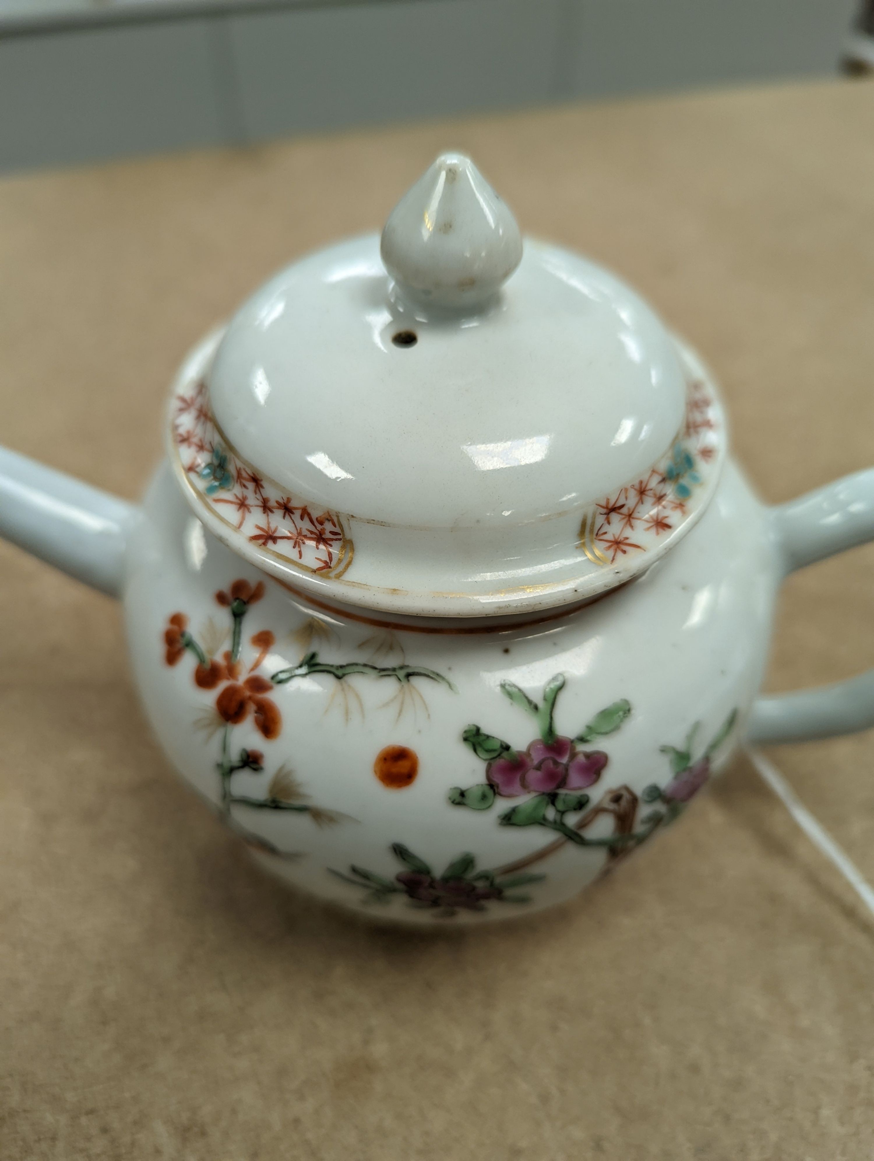 An 18th century Chinese famille rose teapot and associated cover 13cm
